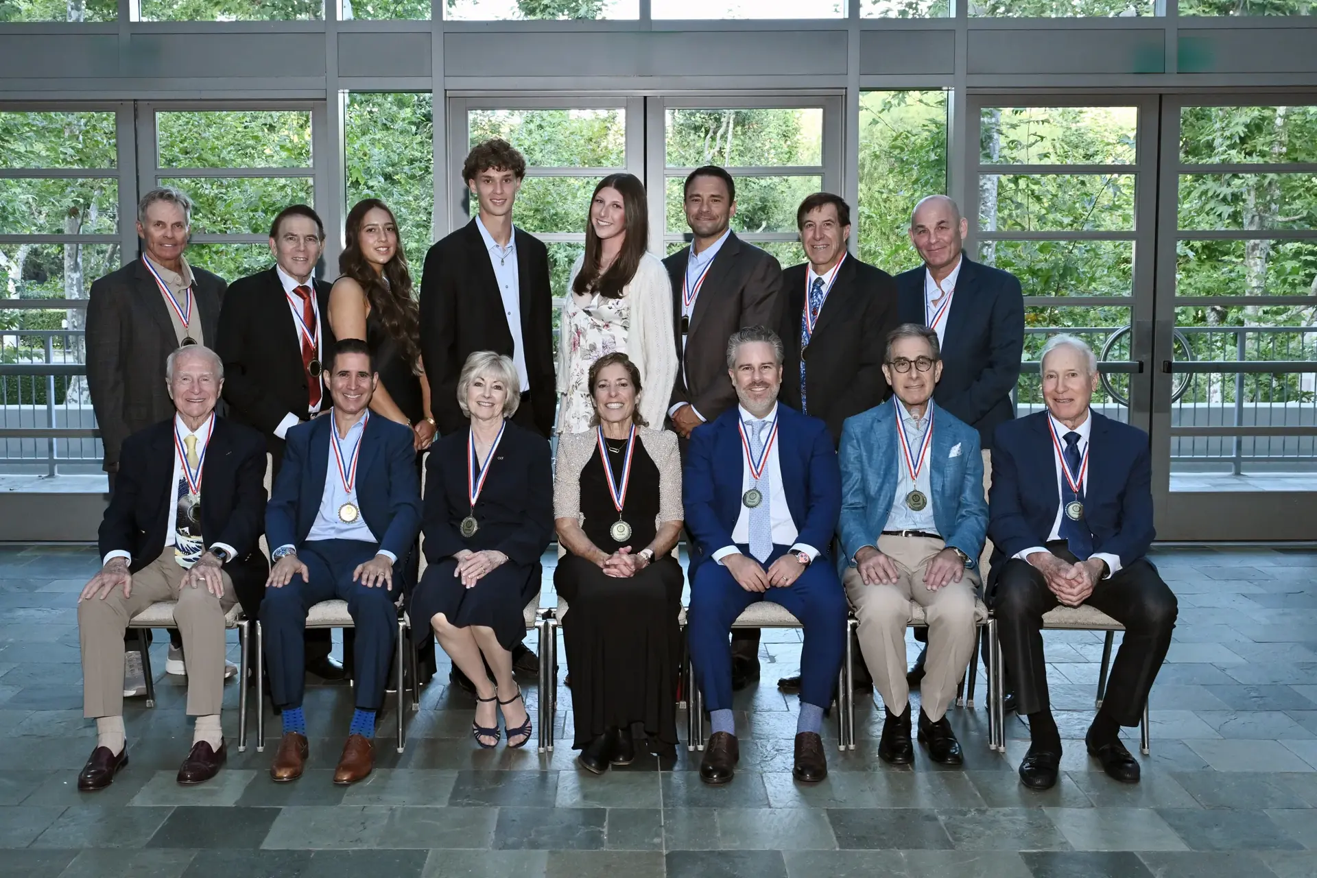 The 2025-2026 Southern California Jewish Sports Hall of Fame induction class — all 15 honorees with their medals in the Skirball Cultural Center foyer